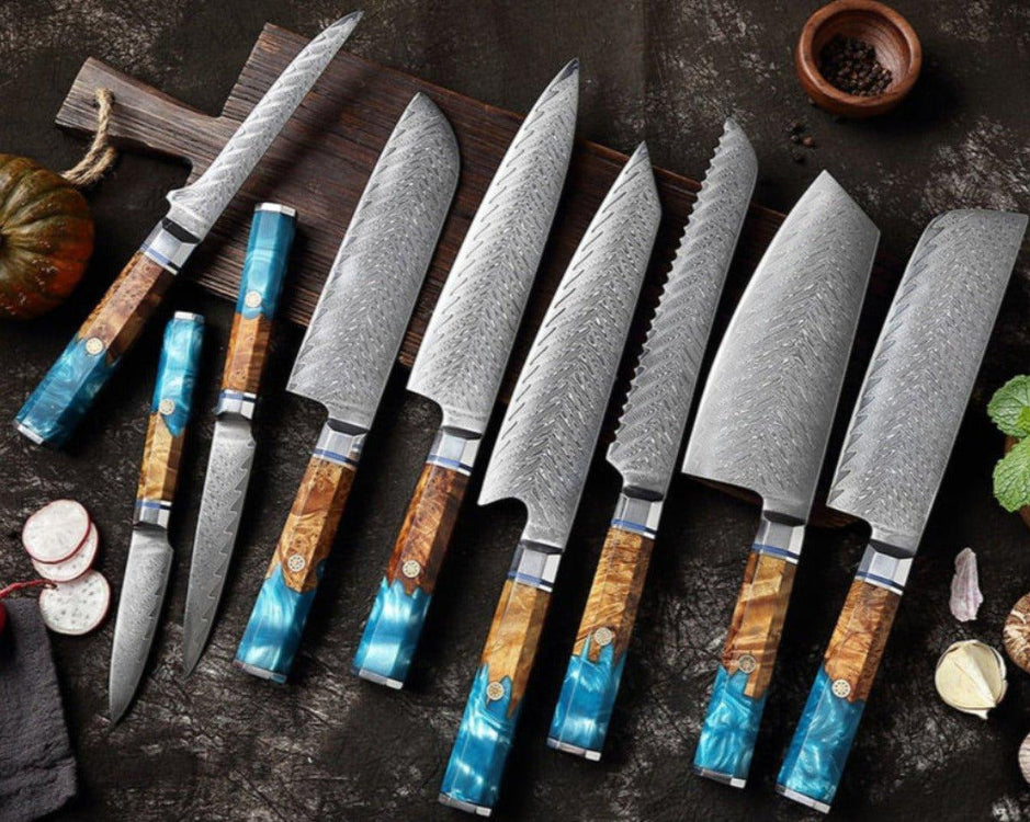Premium kitchen knife set with patterned blades and blue resin wood handles on dark cutting board, Fansee Australia.
