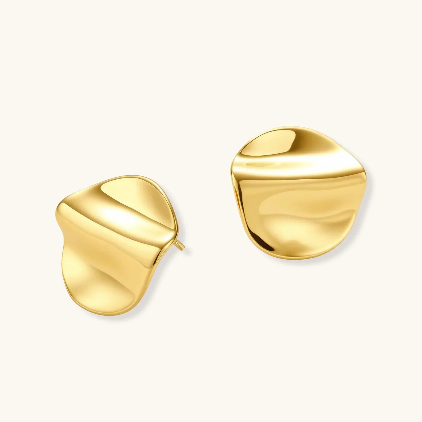 Gold abstract stud earrings with smooth, organic curves for modern home décor styling