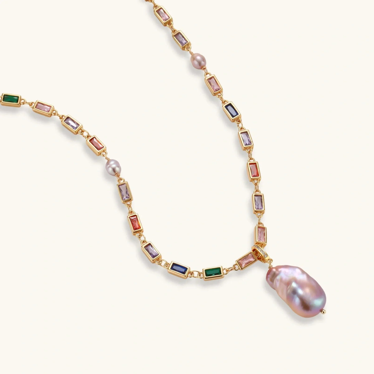 Elegant gold necklace with multicolor gemstones and baroque pearl pendant, luxury jewelry for women