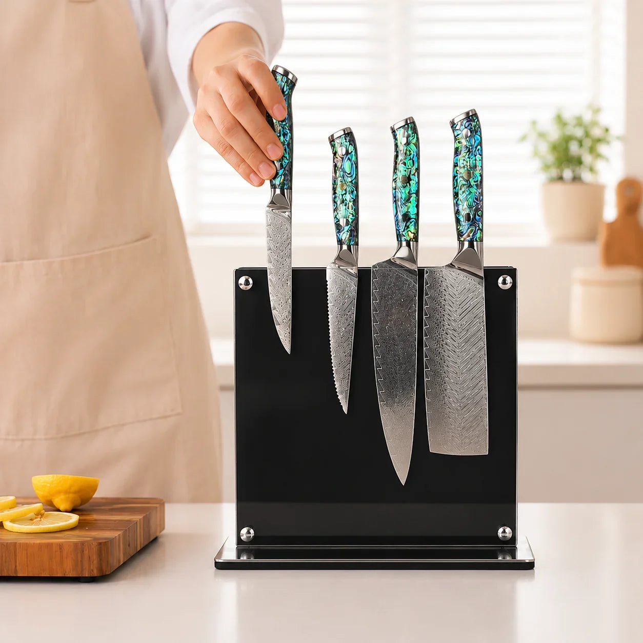 Premium knife set with abalone handles in sleek black block, perfect for modern kitchen décor