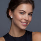 Woman wearing elegant diamond stud earrings, perfect for home décor gifting or personal style