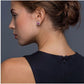 Sterling silver jewelry set featuring pink moissanite stones in halo settings on white background.