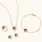 Gold-plated clover jewelry set with red, pink, green and champagne CZ stones surrounded by crystal borders