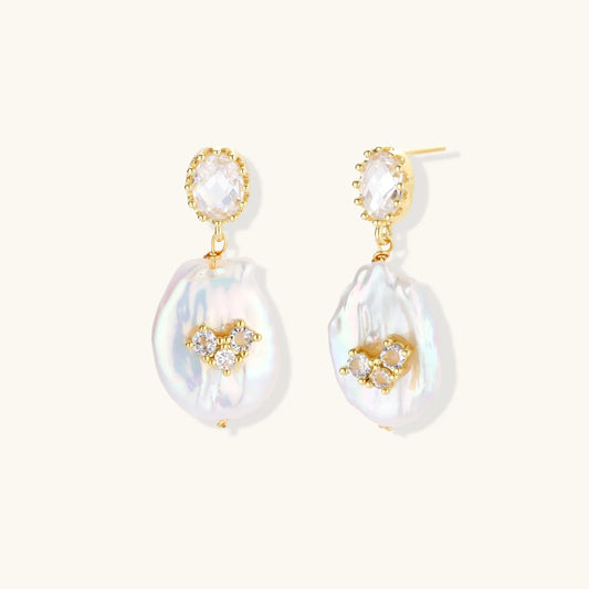 Elegant gold drop earrings with iridescent pearl and crystal accents, perfect for stylish home décor gifting