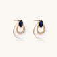 Elegant gold hoop earrings with blue stone and crystal accents, perfect for stylish home décor gifts