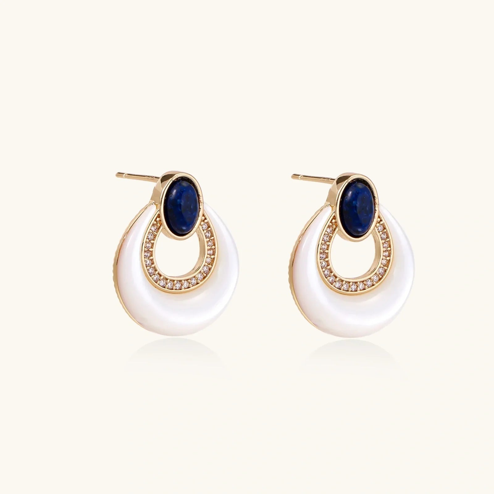 Elegant gold hoop earrings with blue stone and crystal accents, perfect for stylish home décor gifts