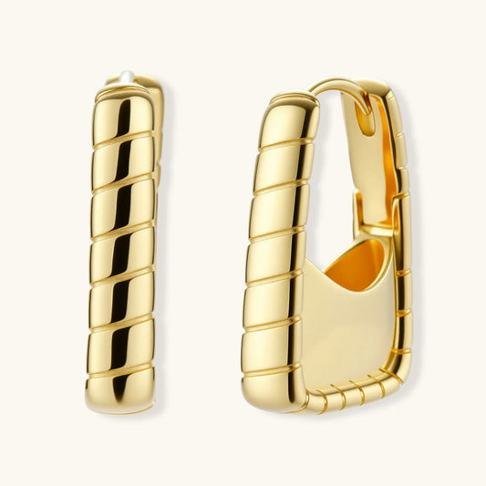 Gold hoop earrings with ribbed texture, modern statement jewelry for stylish home décor
