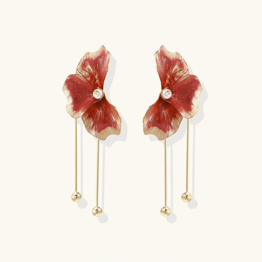 Red enamel flower earrings with pearl center and gold drop details