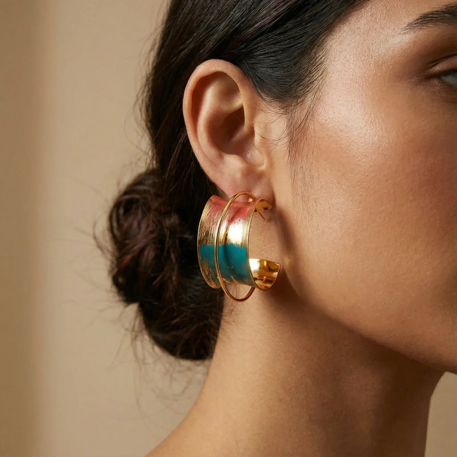 Gold hoop earring with turquoise and coral enamel, stylish statement jewelry for modern home décor lovers