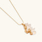 Elegant gold necklace with wavy, layered pendant for modern home décor and unique gifts