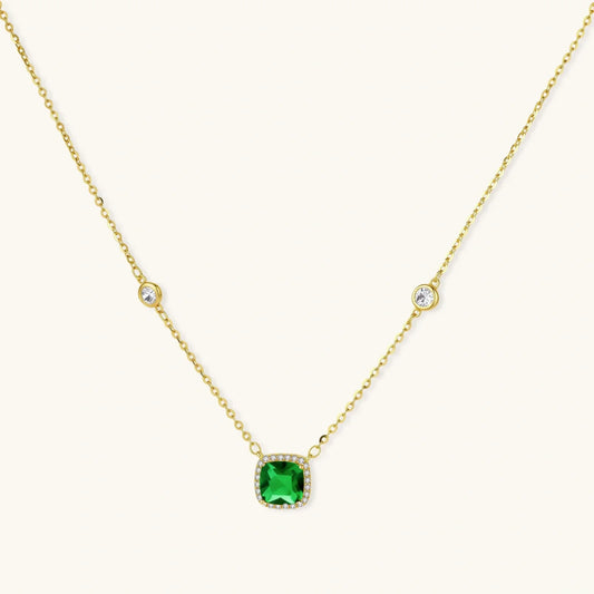 Gold necklace with green cushion-cut gemstone pendant and diamond accents, elegant jewelry for women