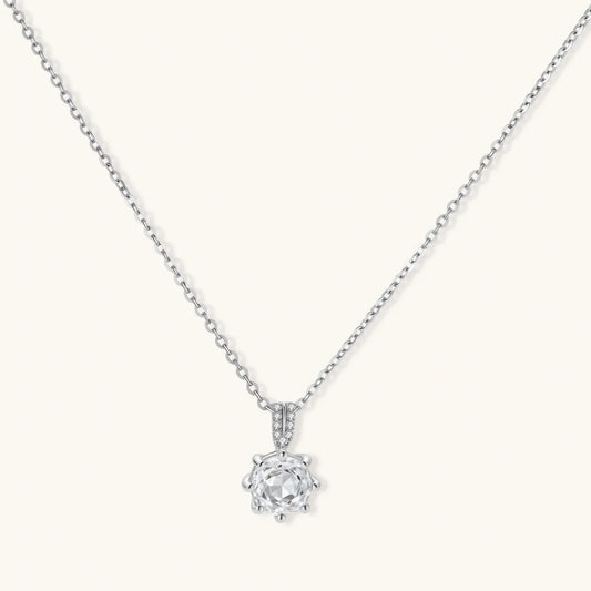 Elegant solitaire diamond pendant necklace with delicate chain, perfect for everyday wear or special occasions.
