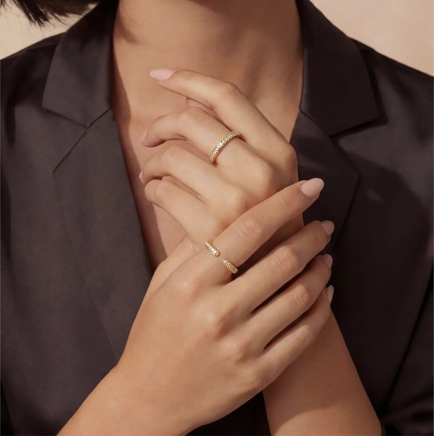 Elegant gold diamond stackable rings on woman's hands, perfect for luxury home styling and gifting