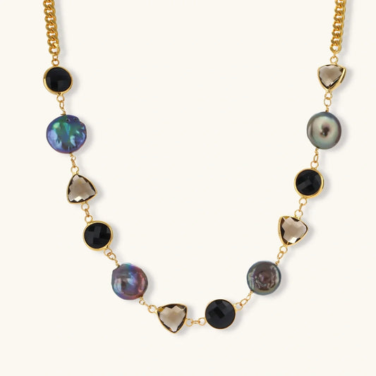 Elegant gold chain necklace with iridescent pearls, black onyx, and smoky quartz stones for stylish home décor gifting.