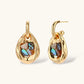 Gold teardrop earrings with iridescent abalone shell inlay, artisan jewelry for elegant home styling