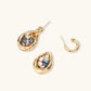 Gold drop earrings with iridescent shell inlay, paired with matching hoop studs for elegant everyday wear