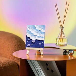 Mini beach canvas art on wooden easel, modern home decor display with reed diffuser