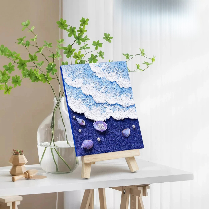 Artisan ocean-themed textured canvas with seashells and pearls on a wooden easel, Fansee Australia home decor