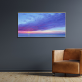 Modern living room with brown leather armchair and colorful ocean sunset wall art, Fansee Australia home decor