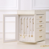 Elegant cream jewelry box with drawers and necklaces, luxury home decor accessory