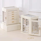 Elegant cream jewelry boxes with gold handles displaying necklaces and rings, Fansee Australia