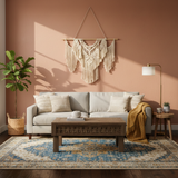 Modern artisan living room with macramé wall decor, neutral sofa, handcrafted wooden coffee table, and boho accents.