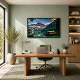 Modern living room with green sofa, wall art of mountain lake landscape, stylish home decor