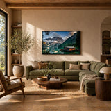 Modern living room with green sofa, wall art of mountain lake landscape, stylish home decor