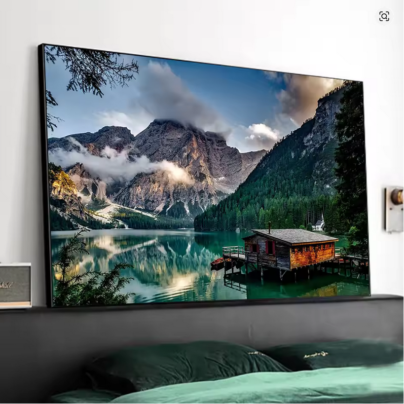 Scandinavian landscape canvas print with mountain, lake, and wooden cabin wall art above bed