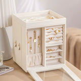 Elegant ivory jewelry box with rings, necklaces, and pearl accessories on a dresser, Fansee Australia home decor.