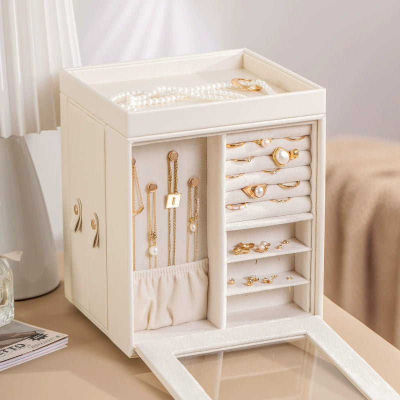 Elegant ivory jewelry box with rings, necklaces, and pearl accessories on a dresser, Fansee Australia home decor.