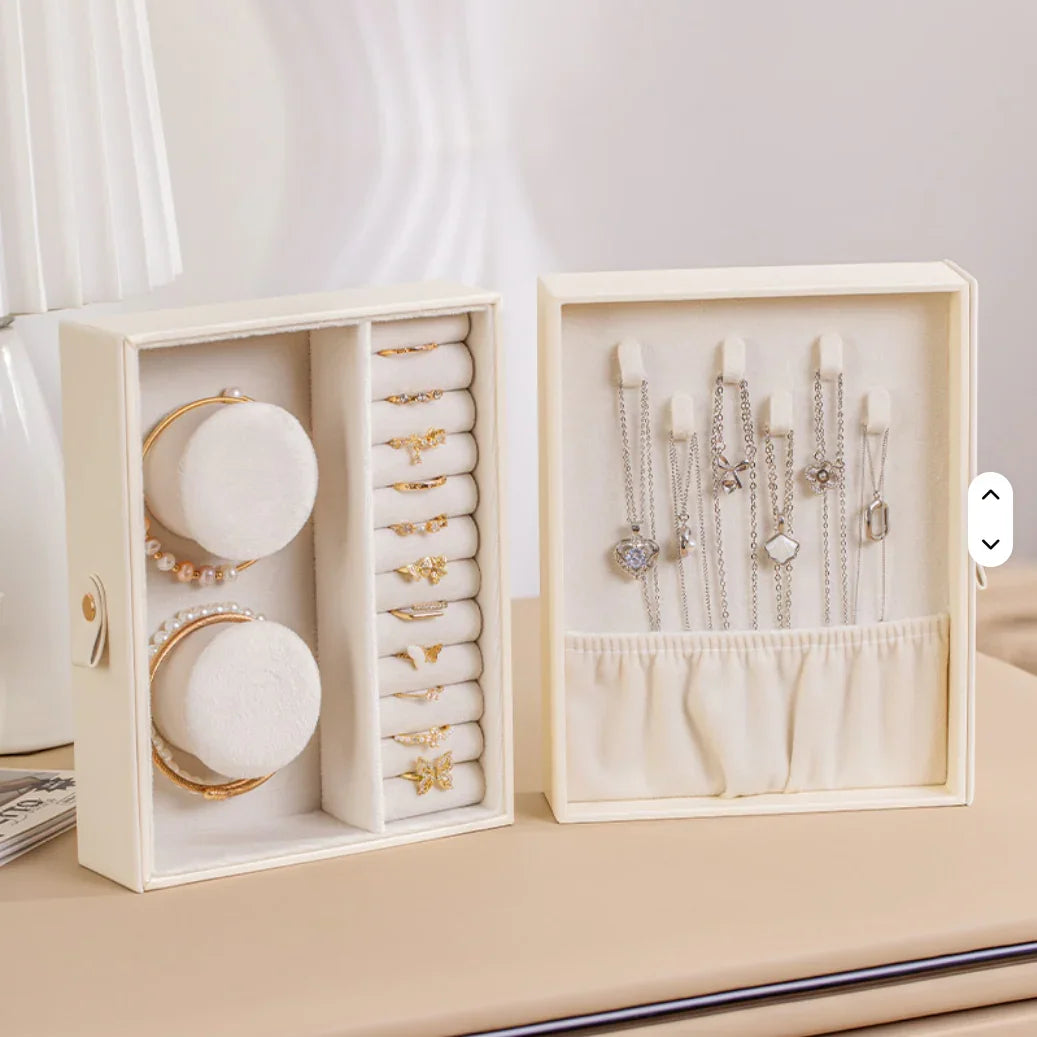 Elegant cream PU rotating jewelry box with rings, bracelets, and necklaces on display, Fansee Australia