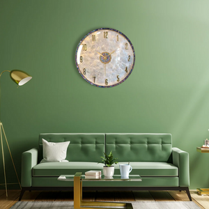 Artisan wall clock above green sofa in modern living room, Fansee Australia home decor