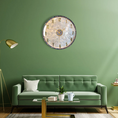 Artisan wall clock above green sofa in modern living room, Fansee Australia home decor