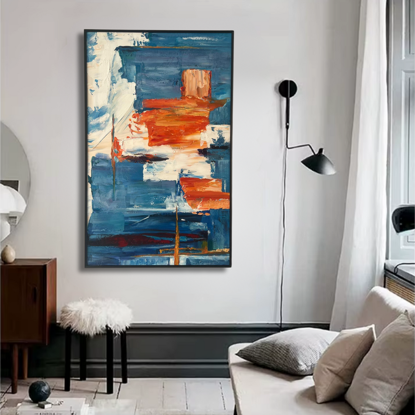 Modern abstract blue and orange wall art in a stylish living room, artisan home decor