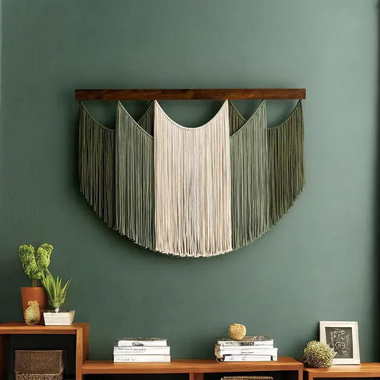 Boho large macrame wall hanging in half circle shape on green wall, modern home decor