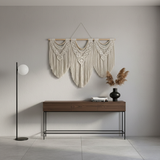 Modern living room with macramé wall art, wooden console, and minimalist decor from Fansee Australia