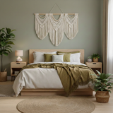 Modern bedroom with artisan home decor, wooden bed, green accents and macrame wall hanging
