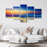 Modern living room with white sofa and table, featuring colorful multi-panel ocean sunset wall art, artisan decor from Fansee Australia.